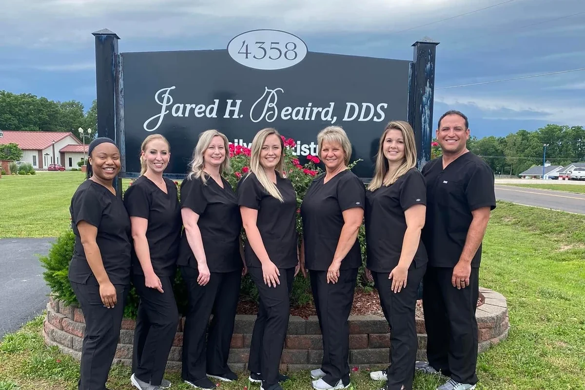 Members of the Poplar Bluff dental team standing outside the office